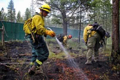 Firefighters from Smith Valley, Marion and the Department of Natural Resources and Conservation responded to a small fire near Ashley Lake on June 24. The blaze burned about a tenth of an acre, according to Smith Valley Chief D.C. Haas. Justin Franz | Flathead Beacon